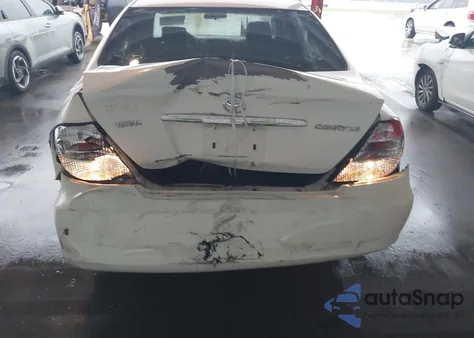 2003 Toyota Camry Le z USA, uszkodzony, nr VIN 4T1BE32KX3U146831